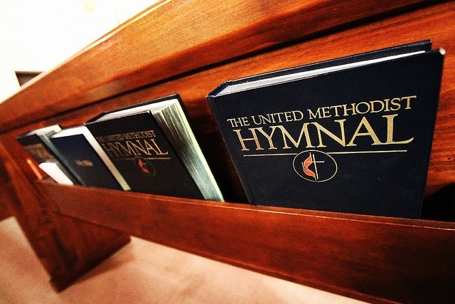 Why do churches sing hymns